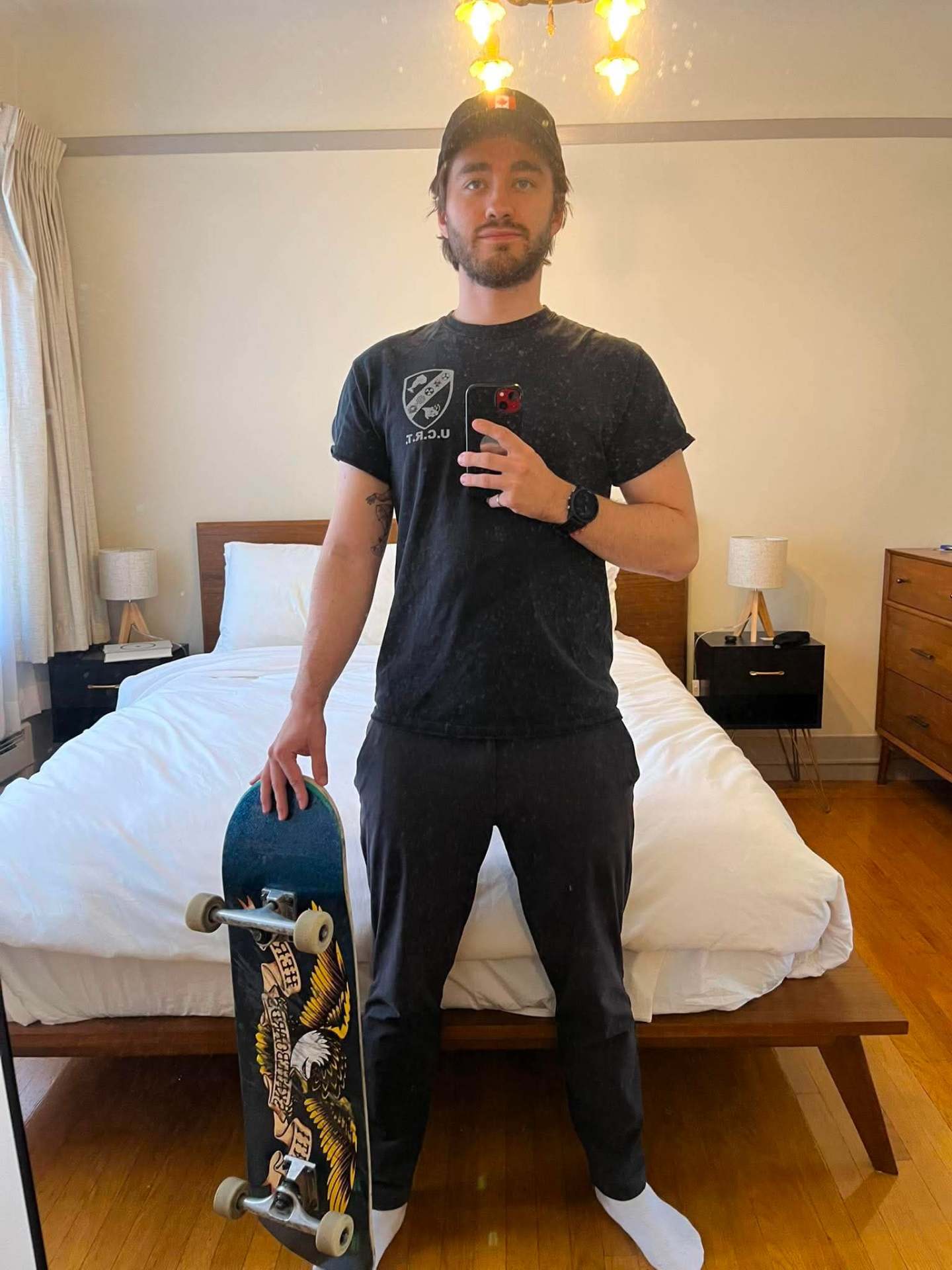 Reference photo of a man with a skateboard sent by a customer