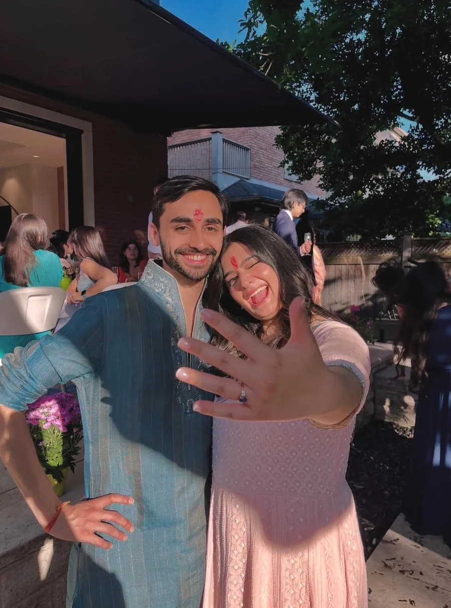 Reference photo of a couple at their engagement celebration sent by a customer